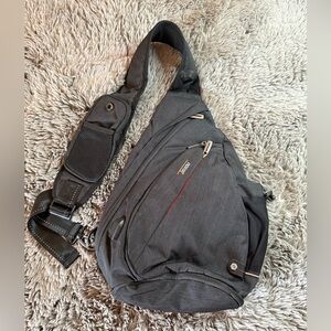 TUDEQU sling bag/crossbody backpack with a USB port